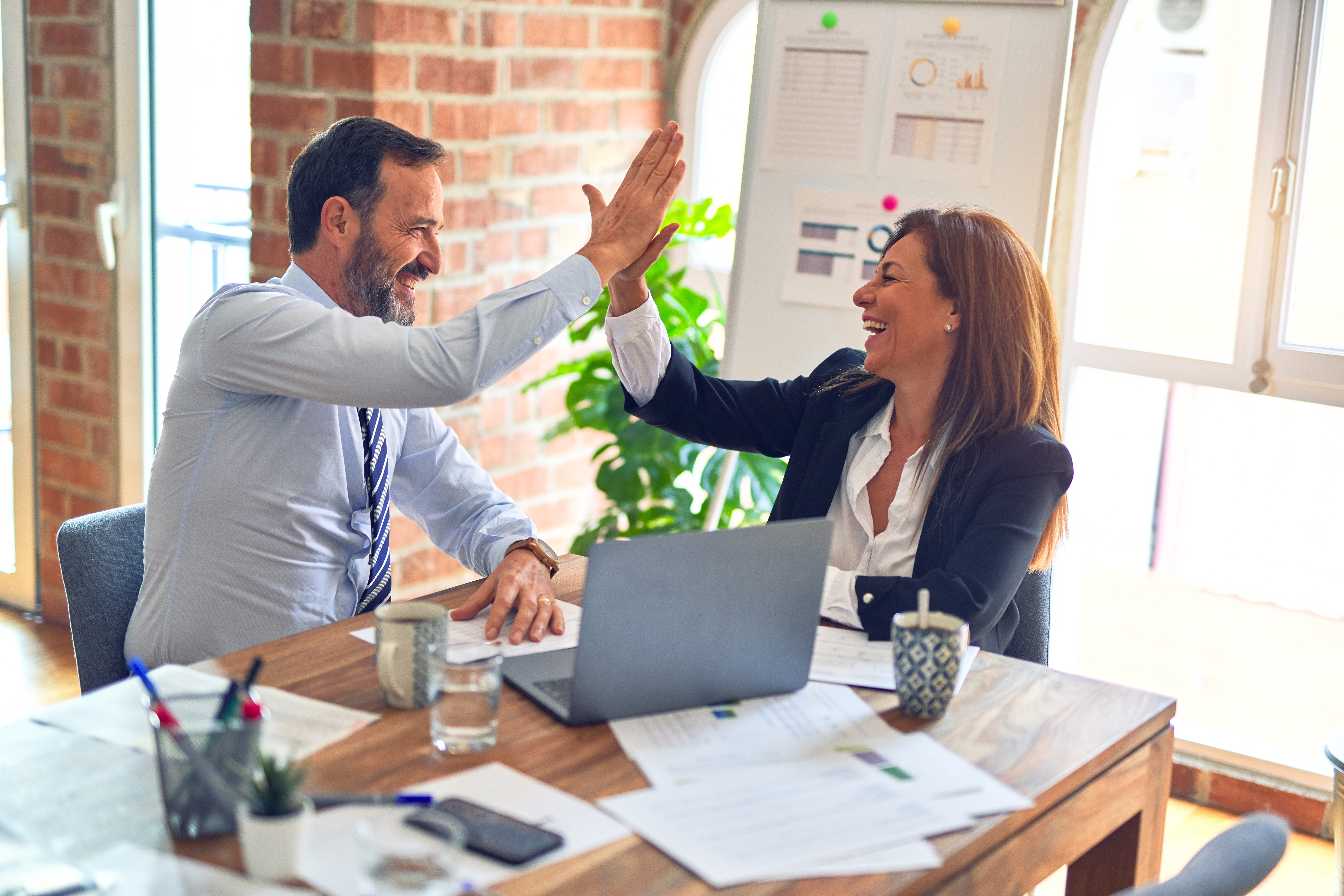 Insurance agents discussing SEO